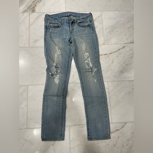 American Eagle women’s size 8 jeans. Distressed with studs. Skinny Stretch.